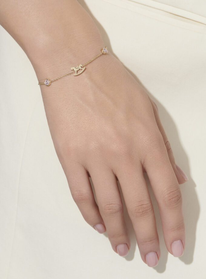 Браслет с бриллиантом и розовыми сапфирами